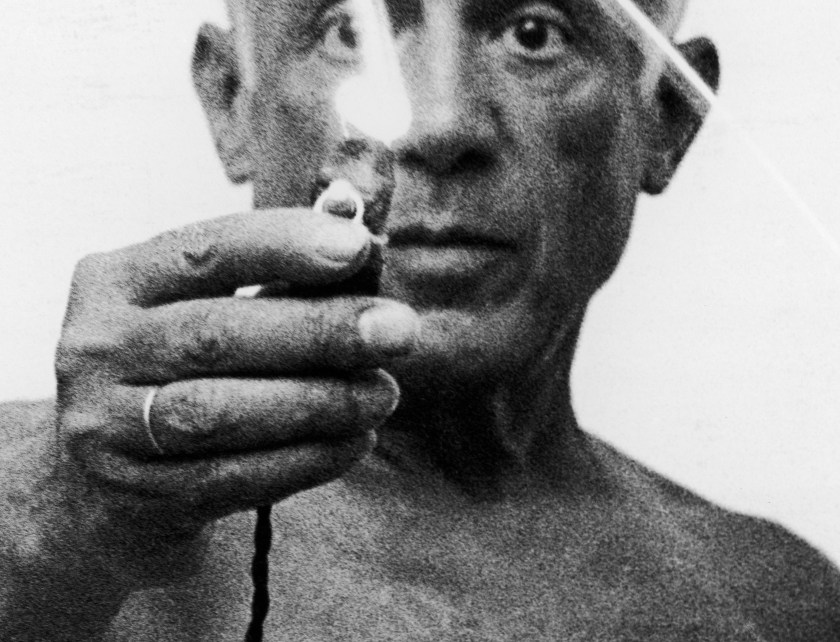 Artist Pablo Picasso using flashlight to begin making light drawing in the air. (Photo by Gjon Mili/The LIFE Picture Collection/Getty Images)