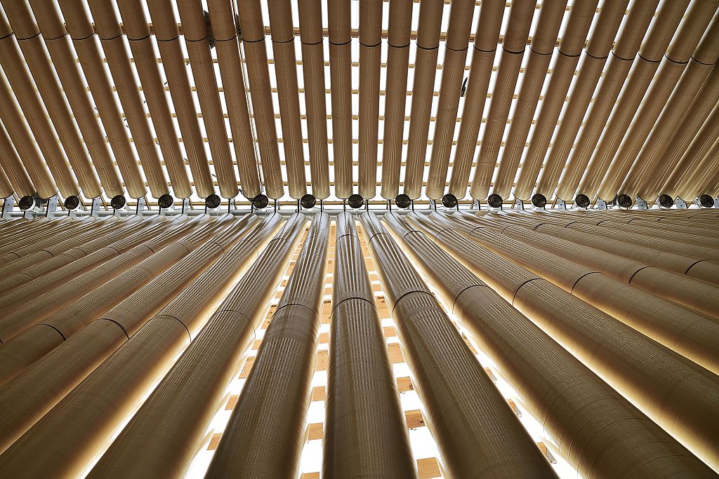 This photo taken on December 30, 2014 shows the cardboard tube roof beams of the Christchurch Cardboard Cathedral building, designed by award-winning Japanese architect Shigeru Ban. The structure, which is a temporary replacement for the 1881 Anglican cathedral destroyed in the February, 2011 quake with killed 185 people, is an A-frame building constructed with weather-proofed cardboard tubes. AFP PHOTO / MARTY MELVILLE (Photo credit should read Marty Melville/AFP/Getty Images)