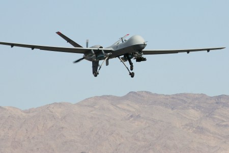 CREECH AIR FORCE BASE, NV - AUGUST 08:  An MQ-9 Reaper takes off August 8, 2007 at Creech Air Force Base in Indian Springs, Nevada. The Reaper is the Air Force's first "hunter-killer" unmanned aerial vehicle (UAV), designed to engage time-sensitive targets on the battlefield as well as provide intelligence and surveillance. The jet-fighter sized Reapers are 36 feet long with 66-foot wingspans and can fly for up to 14 hours fully loaded with laser-guided bombs and air-to-ground missiles. They can fly twice as fast and high as the smaller MQ-1 Predators, reaching speeds of 300 mph at an altitude of up to 50,000 feet. The aircraft are flown by a pilot and a sensor operator from ground control stations. The Reapers are expected to be used in combat operations by the U.S. military in Afghanistan and Iraq within the next year.  (Photo by Ethan Miller/Getty Images)