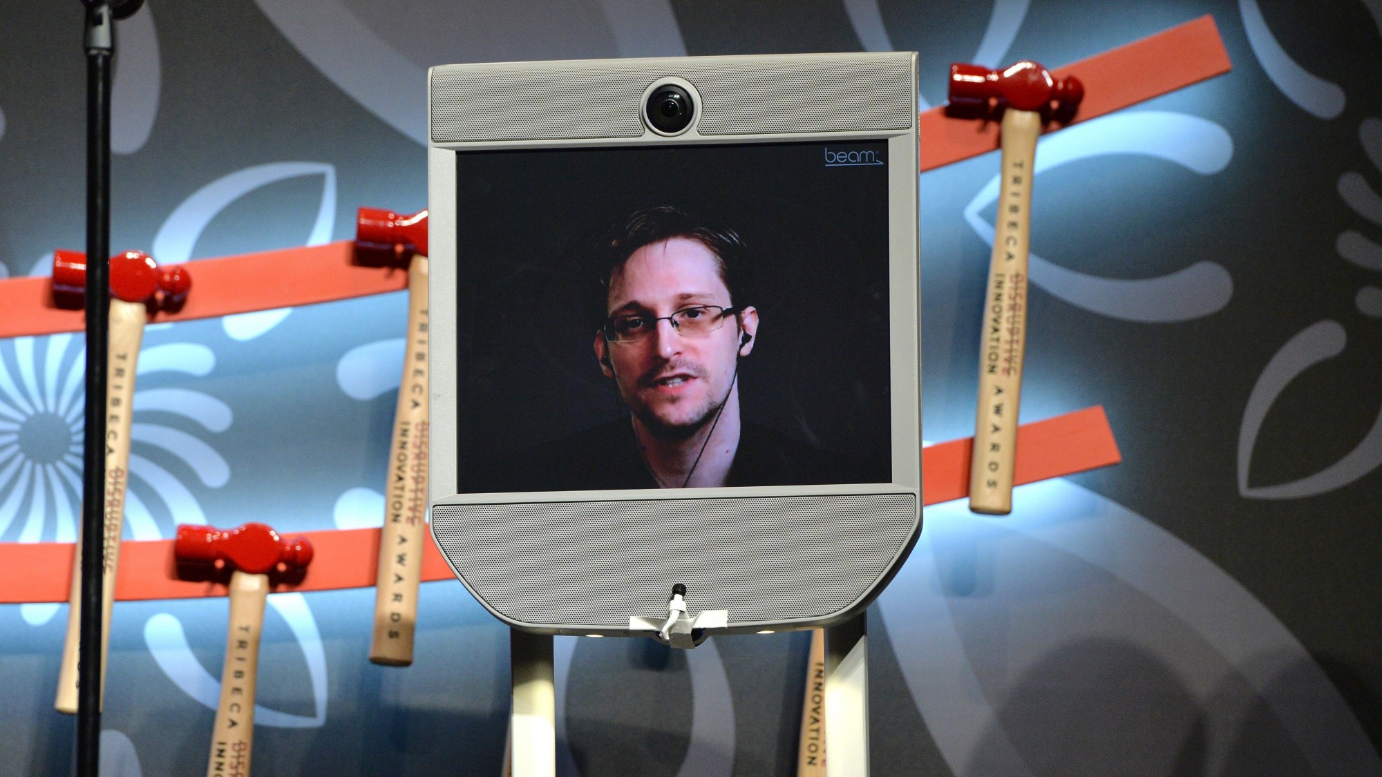 NEW YORK, NY - APRIL 22:  Edward Snowden (via monitor) speaks on stage at Tribeca Disruptive Innovation Awards - 2016 Tribeca Film Festival at BMCC John Zuccotti Theater on April 22, 2016 in New York City.  (Photo by Slaven Vlasic/Getty Images for Tribeca Film Festival)