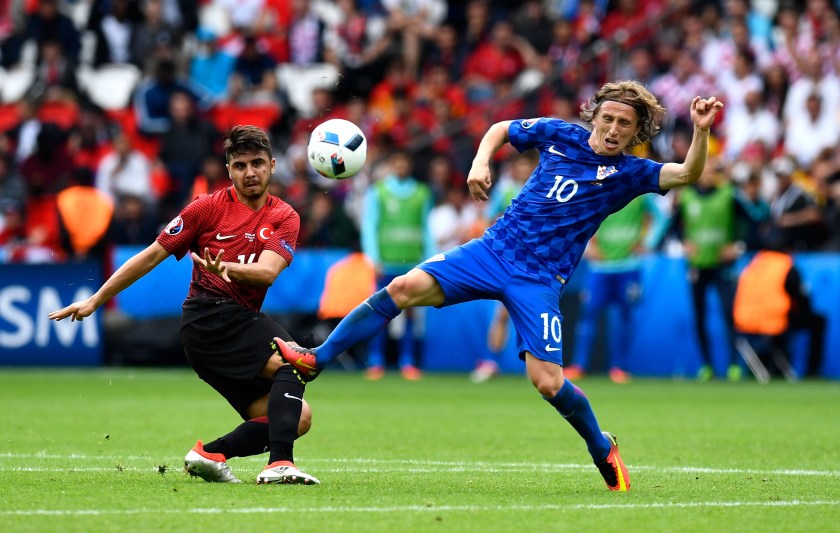 Ozan Tufan of Turkey and Luka Modric of Croatia compete for the ball during the UEFA EURO 2016 Group D match between Turkey and Croatia at Parc des Princes. (Mike Hewitt/Getty Images)