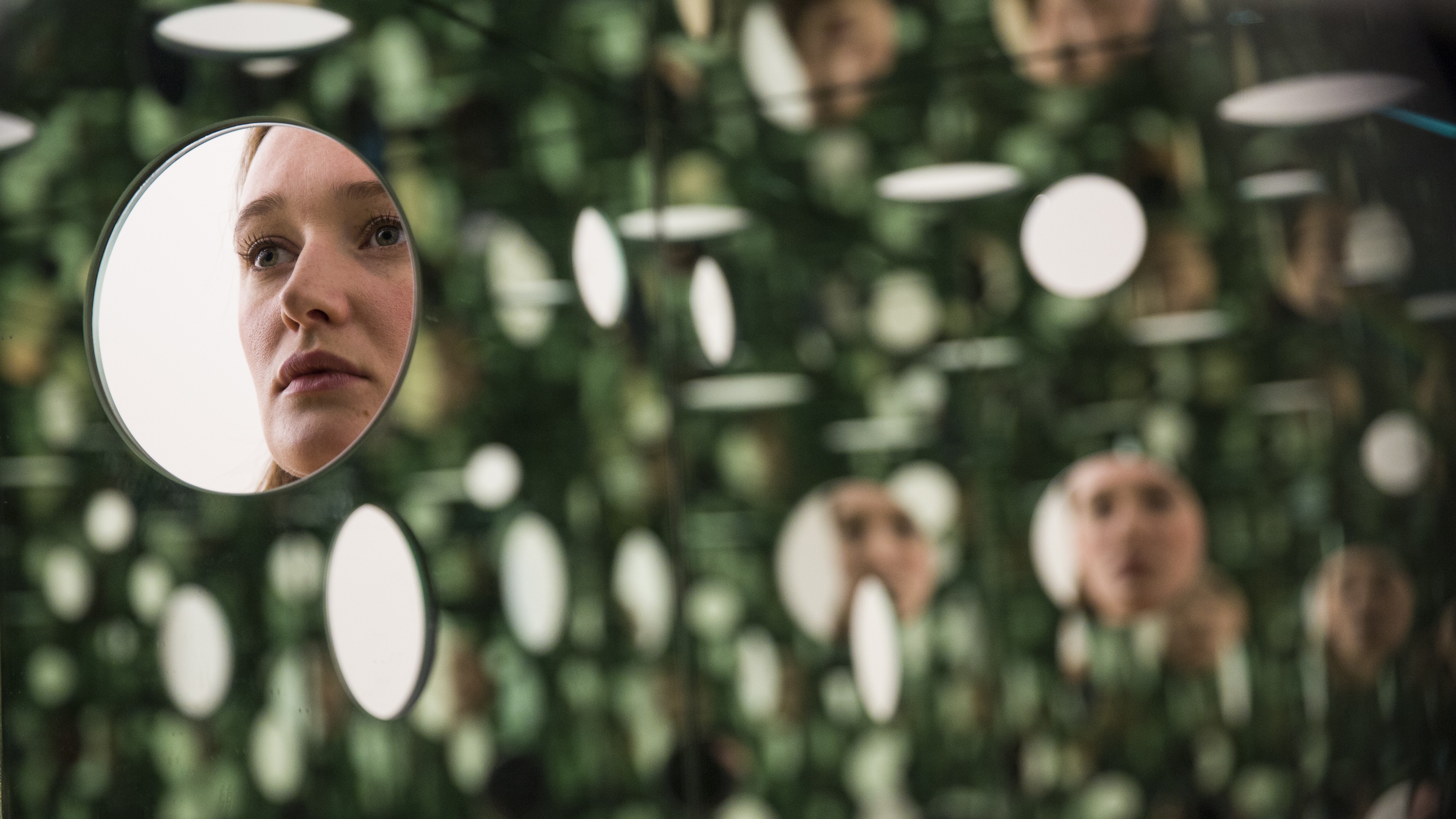 A Tate employee looks into 'The Passing Winter' sculpture by Yayoi Kusama at the Tate Modern's new Switch House. (Jack Taylor/Getty Images)