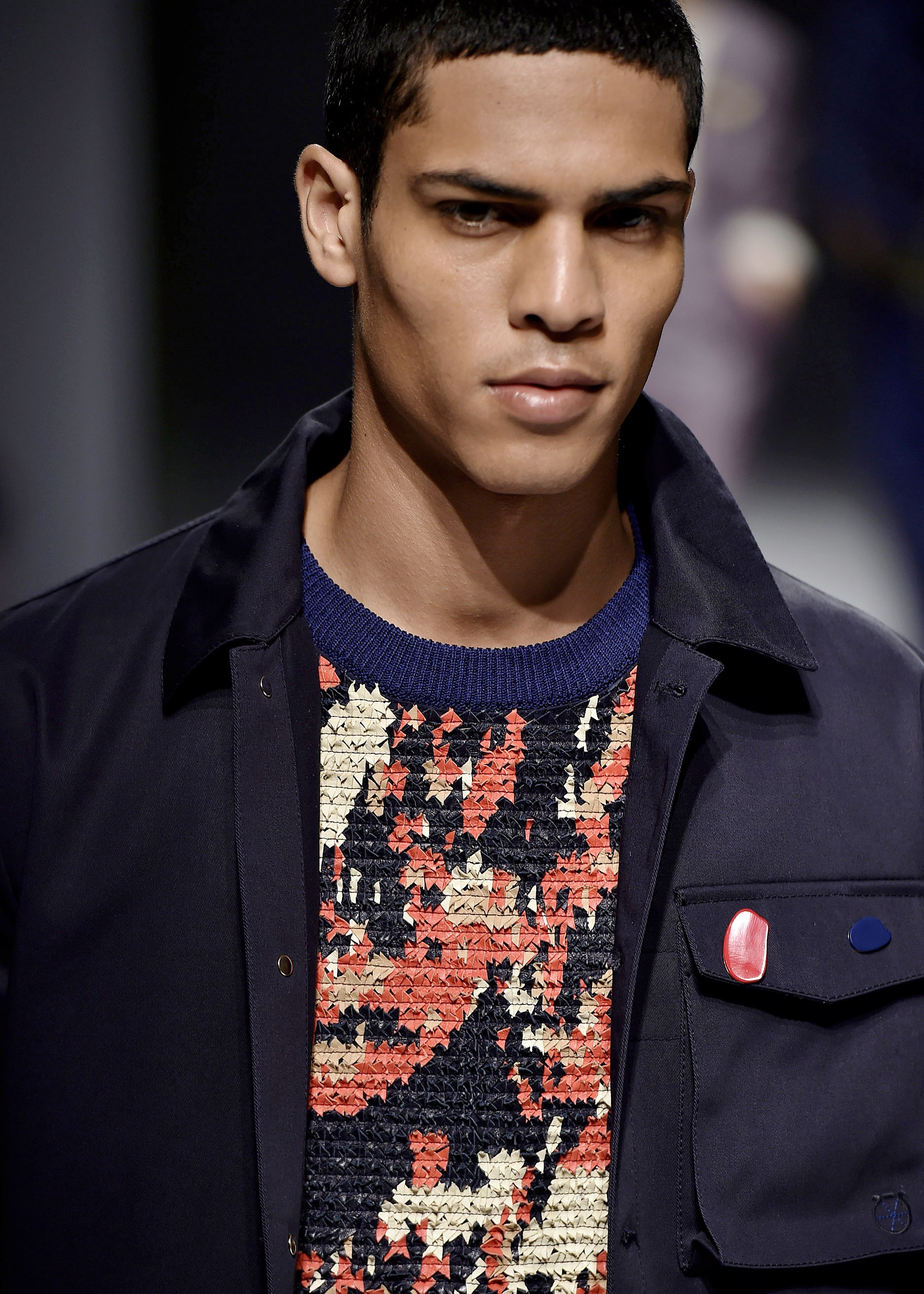 A model walks the runway at the Salvatore Ferragamo Spring Summer 2017 fashion show during Milan Menswear Fashion Week. (Catwalking/Getty Images)