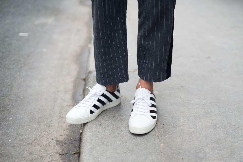 WWD's Alex Badia poses earing Sacai pants and OFF White shoes after the Lemaire show at the Palais de la Femme. (Vanni Bassetti/Getty Images)