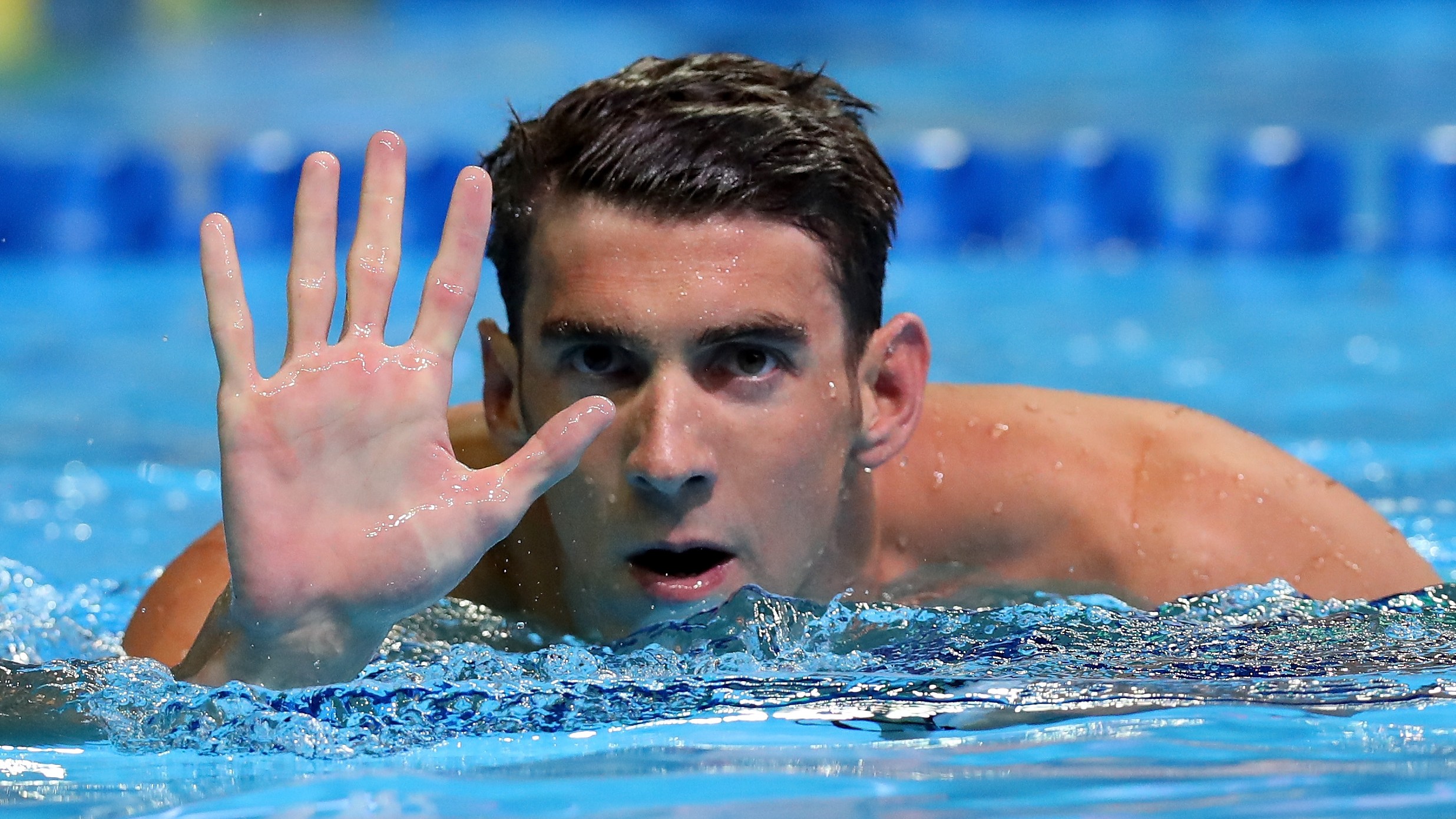 OMAHA, NE - JUNE 29:  Michael Phelps of the United States reacts after winning the final heat for the Men's 200 Meter Butterfly during Day Four of the 2016 U.S. Olympic Team Swimming Trials at CenturyLink Center on June 29, 2016 in Omaha, Nebraska.  (Photo by Tom Pennington/Getty Images)