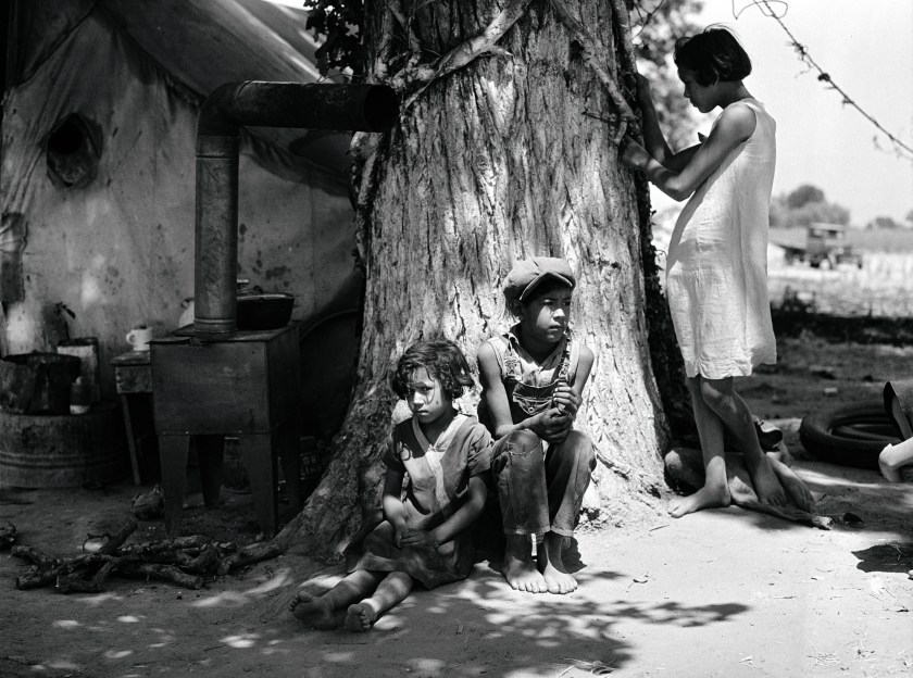 Motherless migrant children that work in the cotton fields in California during June 1935. (Dorothea Lange; Prints and Photographs Division, Library of Congress, Washington, D. C.)