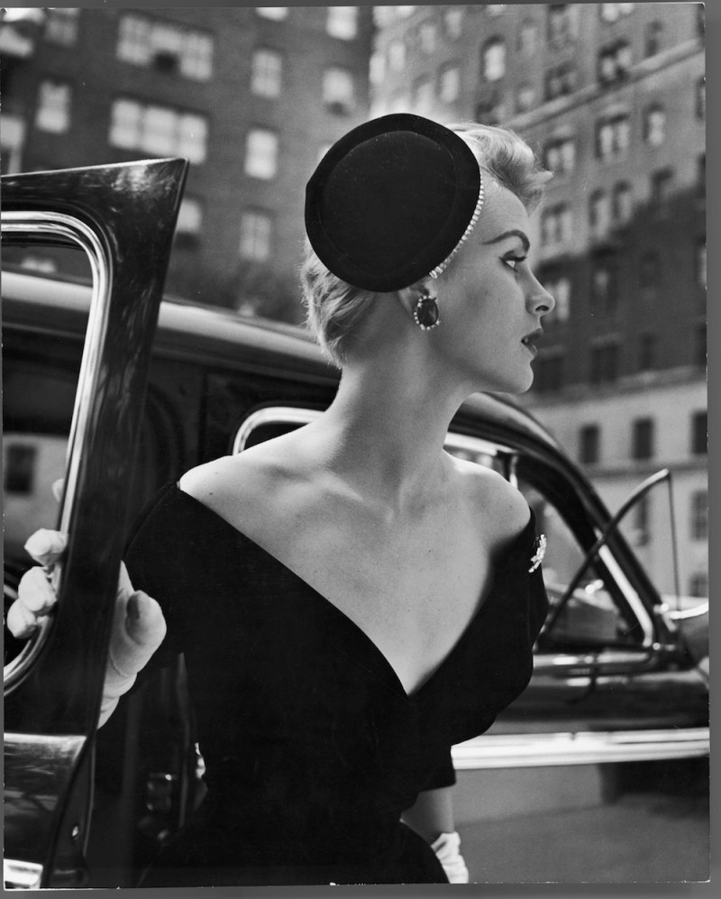 Jeweled Stay Put cocktail hat at reckless angle. Hat is 'Chanda' and the feather comb that holds it invented by Art Director Andrew Smith. (Nina Leen/LIFE Picture Collection)