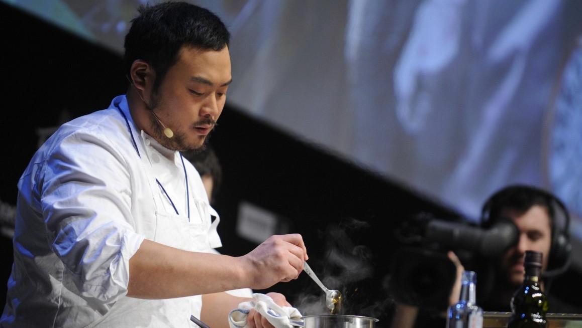 US chef David Chang presents a recipe during the gastronomic fair "Madrid Fusion" on January 21, 2009 in Madrid. Madrid Fusion brings together the world's top chefs for four-days of cooking and and practical tips. AFP PHOTO/ PIERRE-PHILIPPE MARCOU (Photo credit should read PIERRE-PHILIPPE MARCOU/AFP/Getty Images)