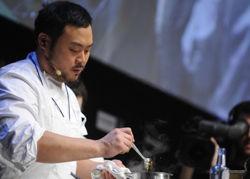US chef David Chang presents a recipe during the gastronomic fair "Madrid Fusion" on January 21, 2009 in Madrid. Madrid Fusion brings together the world's top chefs for four-days of cooking and and practical tips. AFP PHOTO/ PIERRE-PHILIPPE MARCOU (Photo credit should read PIERRE-PHILIPPE MARCOU/AFP/Getty Images)