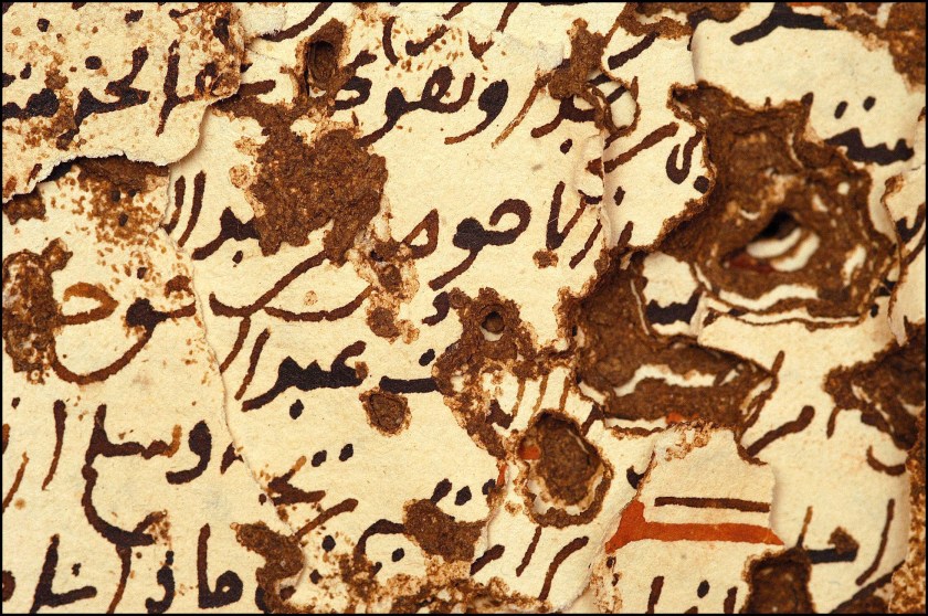 MALI - APRIL 01: Libraries of the desert: rediscovery and restoration of ancient Arab manuscripts in Bouj Beha, Mali in April, 2003 - Timbuktoo: Library of the Ahmed Baba Institute of Islamic advanced studies and research. Manuscript by the prophet called 'Muslim', dating back to the 15th century, and partly damaged by termites. (Photo by Xavier ROSSI/Gamma-Rapho via Getty Images)