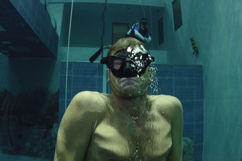 Italian former legend of free diving, Umberto Pelizzari swims up during an apnea course at the "Y-40 The Deep Joy" swimming pool on December 8, 2014 in Montegrotto Terme, northeastern Italy. The swimming pool is built over thermal sources bringing after cooling down a water at 32-34 degrees Celsius. Y-40, with its depth of 42mt, is officially included in the Guinness World Record as the deepest pool in the world for free and scuba diving. (Olivier Morin/AFP/Getty Images)