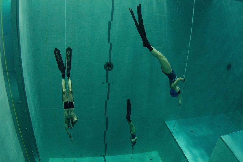 Students swim during an apnea course by Italian free diver, Umberto Pelizzari, at the "Y-40 The Deep Joy" swimming pool on December 8, 2014 in Montegrotto Terme, northeastern Italy. The swimming pool is built over thermal sources bringing after cooling down a water at 32-34 degrees Celsius. Y-40, with its depth of 42mt, is officially included in the Guinness World Record as the deepest pool in the world for free and scuba diving. (Olivier Morin/AFP/Getty Images)