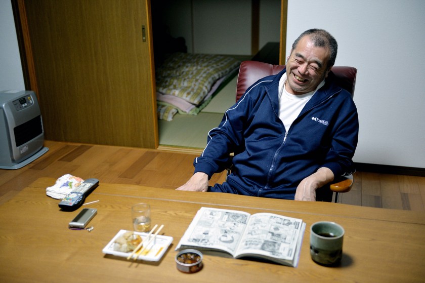 Kazuyoshi Sato, 59, smiles as he returns his home at former no-go zone of the crippled Fukushima Daiichi Nuclear Power Plant in Naraha, Fukushima, Japan. (The Asahi Shimbun via Getty Images)