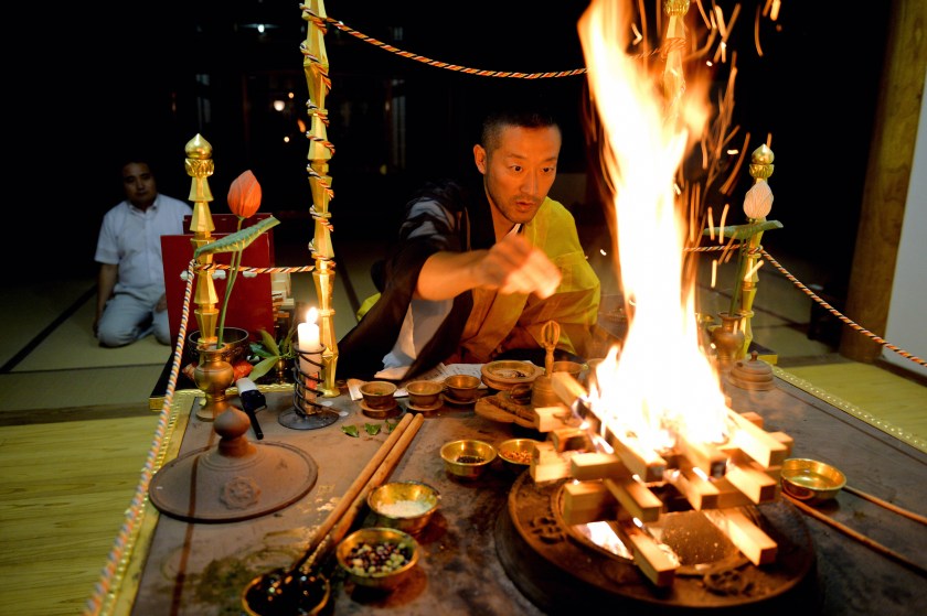 Shukan Sakanushi, head priest of the Dairakuin temple, performs a ceremony praying for the rebuilding of his hometown on September 5, 2015 in Naraha. (The Asahi Shimbun via Getty Images)
