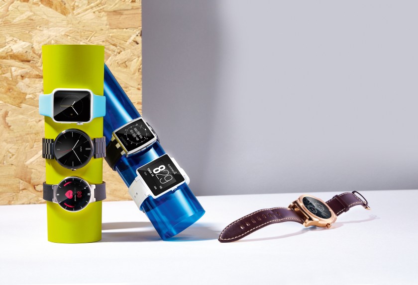 A selection of smart watches, including an Apple Watch, Pebble Steel, Garmin Vivoactive, Alcatel OneTouch, Motorola Moto 360 and an LG Urbane. (Neil Godwin/T3 Magazine via Getty Images)