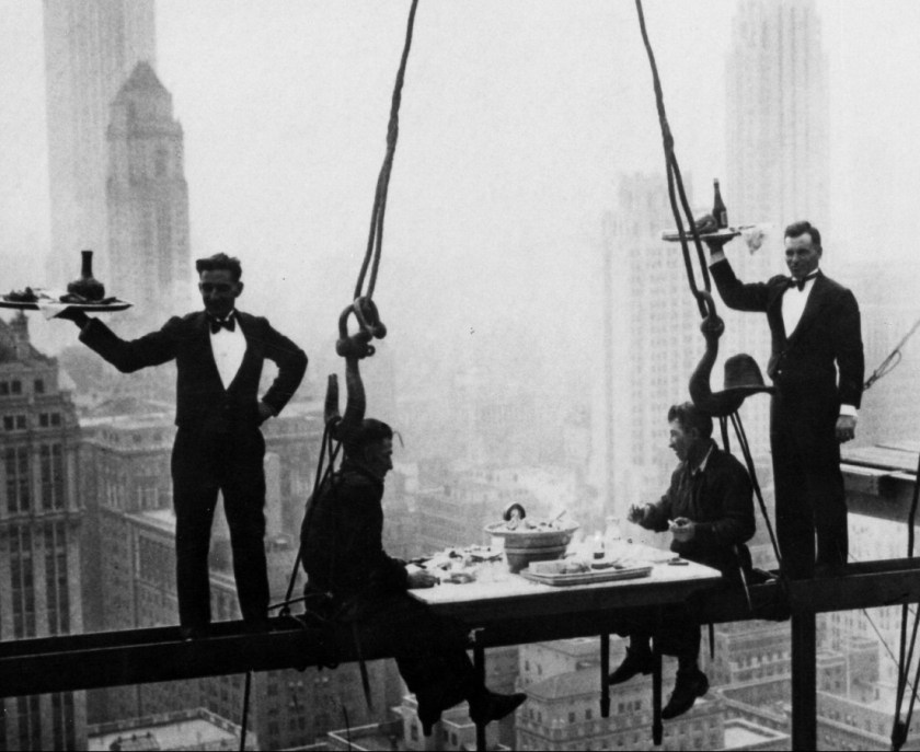 (GERMANY OUT) NEW YORK: WALDORF-ASTORIA. Construction workers having lunch on a suspended I-beam during the construction of the present day Waldorf-Astoria Hotel on Park Avenue at 49th Street, New York. Photograph, c1930. (Photo by ullstein bild/ullstein bild via Getty Images)
