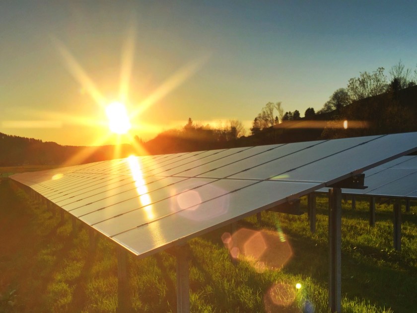 Solar Panels At Sunset