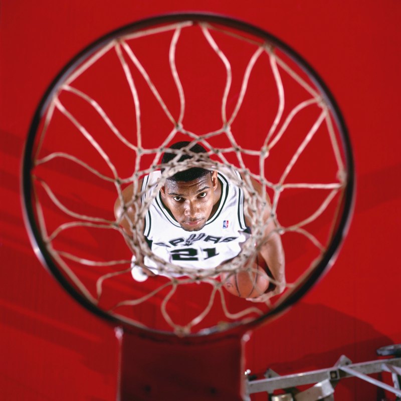 SAN ANTONIO, TX - 1997: Tim Duncan of the San Antonio Spurs during a portrait shoot in San Antonio, Texas. NOTE TO USER: User expressly acknowledges that, by downloading and or using this photograph, User is consenting to the terms and conditions of the Getty Images License agreement. Mandatory Copyright Notice: Copyright 1997 NBAE (Photo by Glenn James/NBAE via Getty Images)