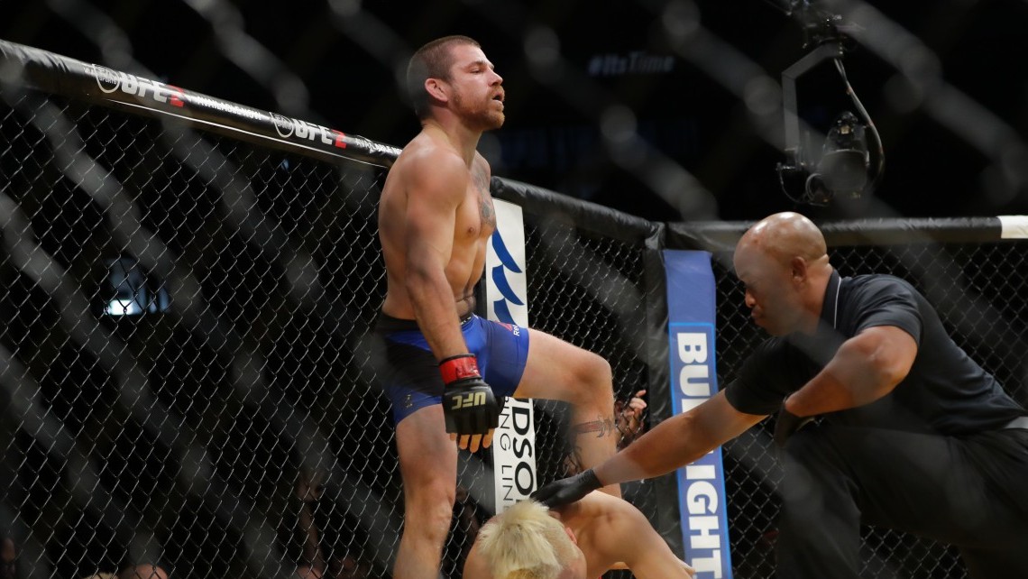 LAS VEGAS, NV - JULY 9: The referee stops between Jim Miller and Takanori Gomi during the UFC 200 event at T-Mobile Arena on July 9, 2016 in Las Vegas, Nevada. (Photo by Rey Del Rio/Getty Images)