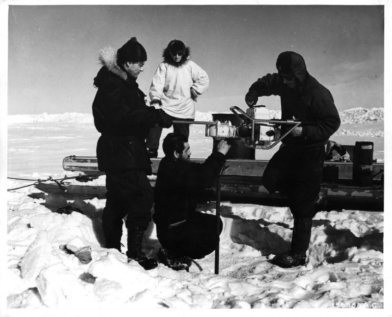 Scientists drill a hole in the huge cake of ice during construction of the Arctic camp site in Greenland. (Photo by Pictorial Parade/Archive Photos/Getty Images)