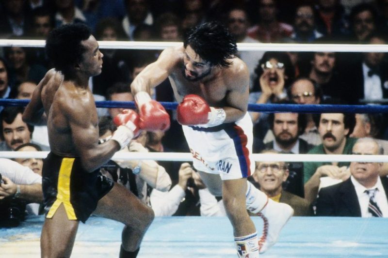 NEW ORLEANS - NOVEMBER 25,1980: Roberto Duran (R) leaps to land the punch against Sugar Ray Leonard during the fight at the Superdome in New Orleans, Louisiana. Sugar Ray Leonard won the WBC welterweight title by a TKO 8. (Photo by: The Ring Magazine/Getty Images)