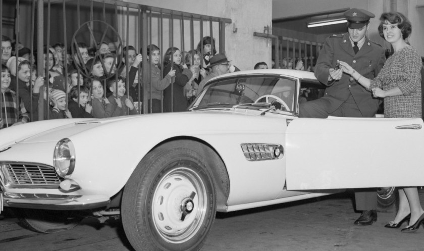 Elvis Presley is seen here accepting the keys for his BMW 507 sports car in 1958.(Getty)