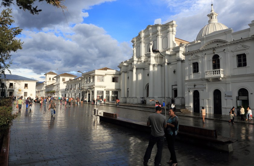 Pedestrians walk past Nuestra Senora Basilica in Parque Caldes. (Getty Images)