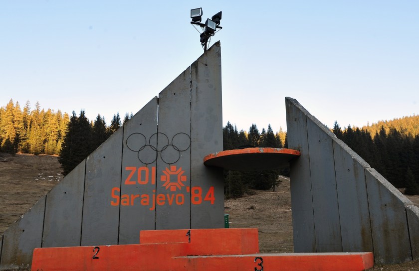 TO GO WITH STORY BY RUSMIR SMAJILHODZIC - A picture taken on February 5, 2014 shows the partialy rebuilt winners podium of Sarajevo's abandoned ski jumping venue at Mt. Igman near Sarajevo. Built and used as an Olympic venue during Sarajevo's 1984 Winter Olympic Games, the ramps were heavily damaged during Bosnia's 1992-95 war. They were never rebuilt and it's large concrete structure remains standing as a memento of past. AFP PHOTO ELVIS BARUKCIC / AFP / ELVIS BARUKCIC (Photo credit should read ELVIS BARUKCIC/AFP/Getty Images)
