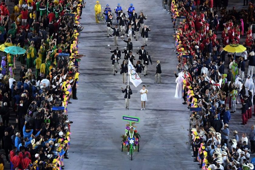 The Olympic Refugee team enter the athletes parade during the Opening Ceremony of the Rio 2016 Olympic Games at Maracana Stadium on August 5, 2016 in Rio de Janeiro, Brazil. (Richard Heathcote/Getty Images)