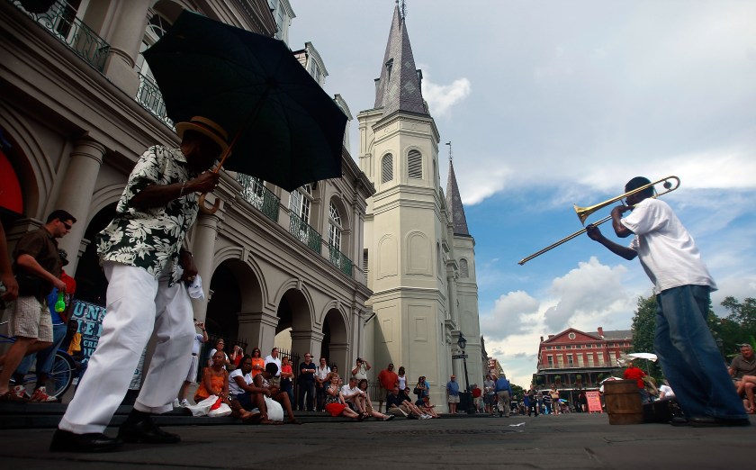 NEW ORLEANS - MAY 15: A band performs in the French Quarter May 15, 2009 in New Orleans, Louisiana. Tourism is the number one industry in New Orleans, over 400,000 people attended this year?s JazzFest, the largest crowd since Hurricane Katrina. New Orleans continues to be revitalized with $19 billion in federal rebuilding money yet to be spent along with $3.8 billion in federal stimulus funds in the pipeline. However the city still has more than 68,000 vacant homes, most of which have were damaged by Hurricane Katrina in August, 2005. (Photo by Mario Tama/Getty Images)