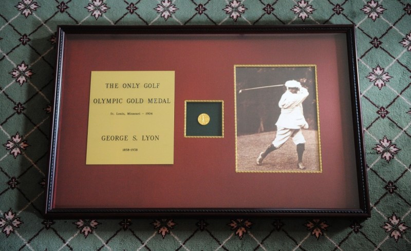 AUG 12TH 2009.pics of. canadas george lyon won the olympic gold medal for golf the last time the sport was included in the olympics in 1904.the medal is on display behind the bar of the rosedale golf club.on thursday the international committee will decide if golf will be back in the olympics for 2016 games.shots of the photo that sits behind the bar.(COLIN MCCONNELL STAR) (Photo by Colin McConnell/Toronto Star via Getty Images)