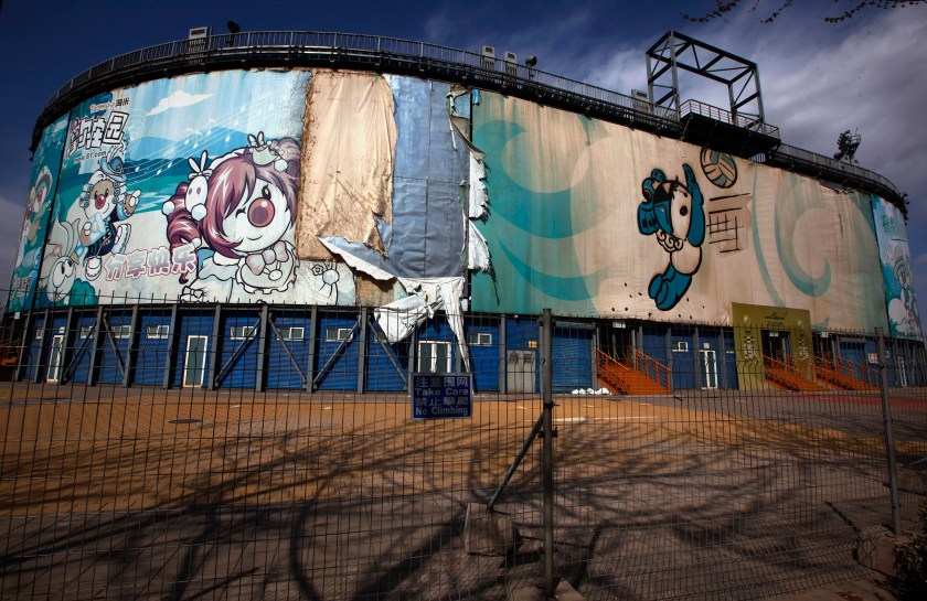 The 2008 Beijing Olympics venue for the beach volleyball competition lies deserted and unmaintained in central Beijing April 2, 2012. The gigantic infrastructures built for the Beijing Olympics, namely the National Stadium, better known as the "Bird's Nest", and the National Aquatics Center, better known as the "Water Cube", are now used for cultural and sports events, reminding the world of the flare that blazed during the summer of 2008. However, some other Beijing Olympic venues, such as the rowing and kayaking centre, baseball arena and BMX track, have been left either deserted or been completely demolished. Picture taken April 2, 2012. ATTENTION EDITORS - 14 of 21 PICTURES FOR PACKAGE 'BEIJING'S DESERTED OLYMPIC SITES' REUTERS/David Gray (CHINA - Tags: SPORT OLYMPICS TPX IMAGES OF THE DAY) - RTR30IMH