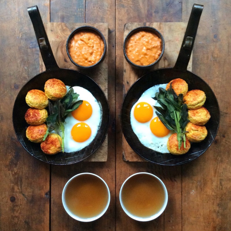Paprika biscuits with eggs and a sobrassada gravy (From SymmetryBreakfast by Michael Zee, published by powerHouse Books)