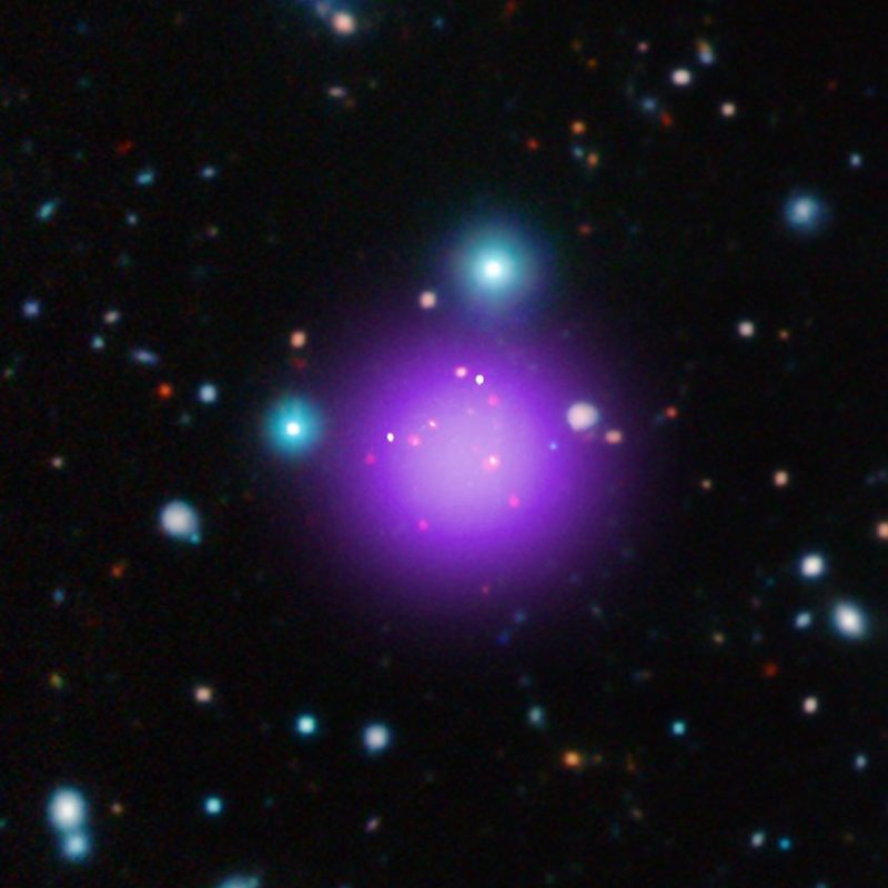 This image contains the most distant galaxy cluster, a discovery made using data from NASA’s Chandra X-ray Observatory and several other telescopes. The galaxy cluster, known as CL J1001+0220, is located about 11.1 billion light years from Earth and may have been caught right after birth, a brief, but important stage of cluster evolution never seen before. (NASA)