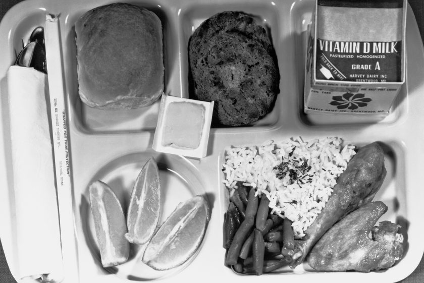 A Type A school lunch as specified by the Department of Agriculture, with a protein food, fruits, vegetables, bread and butter, and milk, Washington DC, June 1, 1966. ( Underwood Archives/Getty Images)