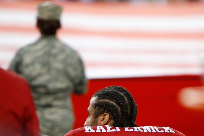 Colin Kaepernick #7 of the San Francisco 49ers kneels in protest during the national anthem prior to playing the Los Angeles Rams in their NFL game at Levi's Stadium on September 12, 2016 in Santa Clara, California. (Robert Reiners/Getty Images)