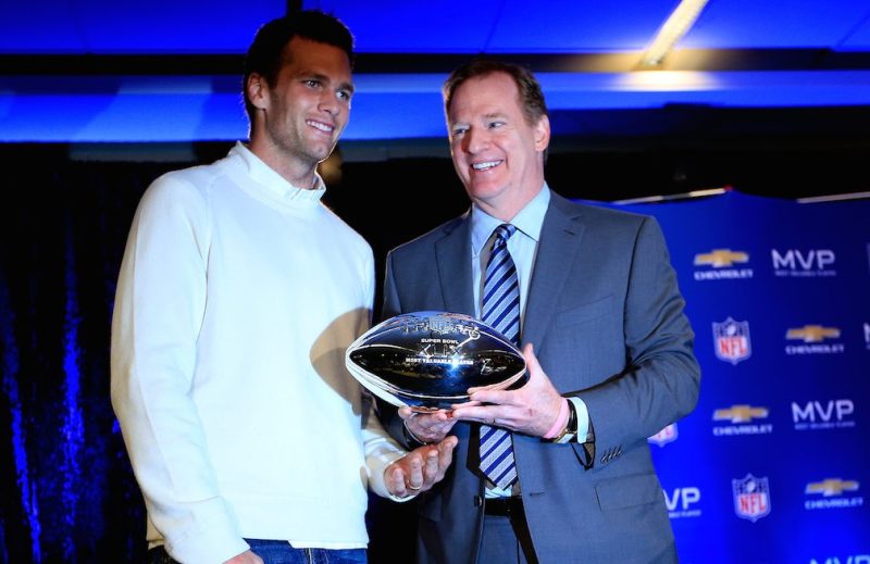 PHOENIX, AZ - FEBRUARY 02: (L-R) Tom Brady of the New England Patriots with NFL Commissioner Roger Goodell and the Super Bowl XLIX MVP trophy during a press conference folowing the Patriots Super Bowl win over the Seattle Seahawks on February 2, 2015 in Phoenix, Arizona. (Photo by Jamie Squire/Getty Images)