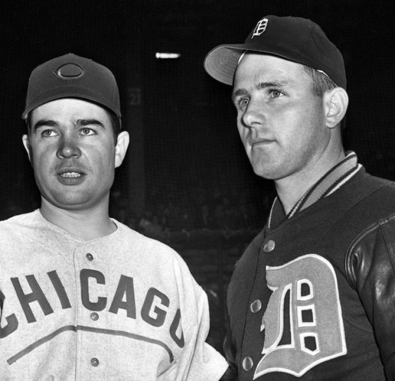 Hank Wyse (left), of the Cubs, and Virgil Trucks, of Detroit, shake hands before the start of the second World Series game, in which they took the mounds for their respective teams. Hank was yanked for a pinch-hitter in the seventh, but Virgil stayed all the way to ring up a 4-1 victory for Detroit.