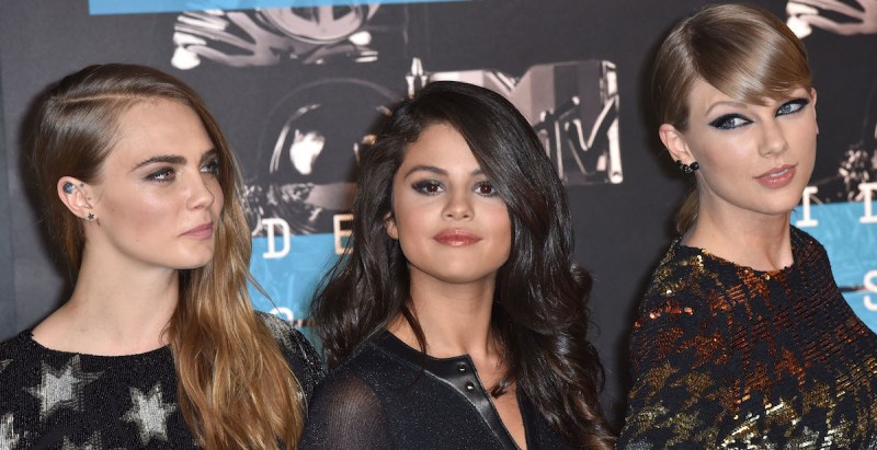 LOS ANGELES, CA - AUGUST 30: (L-R) Model Cara Delevingne, recording artists Selena Gomez and Taylor Swift arrive to the 2015 MTV Video Music Awards at Microsoft Theater on August 30, 2015 in Los Angeles, California. (Photo by C Flanigan/Getty Images)