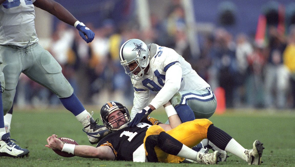 Football: Super Bowl XXX: Dallas Cowboys Charles Haley (94) kneeling over Pittsburgh Steelers QB Neil O'Donnell (14) after sack at Sun Devil Stadium.
Tempe, AZ 1/28/1996
CREDIT: Walter Iooss Jr. (Photo by Walter Iooss Jr. /Sports Illustrated/Getty Images)
(Set Number: X50007 TK2 R3 F17 )