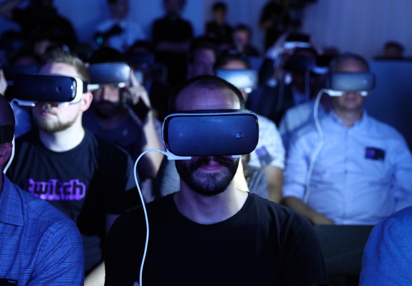 Visitors wear Gear VR 4D Experience headsets with the Galaxy Note 7 smartphone during a Samsung Electronics Co. 'Unpacked' launch event in London, U.K., on Tuesday, Aug. 2, 2016. The South Korean company announced the latest iteration of its large-screen smartphone with the 5.7-inch Note 7 that can be unlocked with an iris-scanning camera. (Chris Ratcliffe/Bloomberg via Getty Images)