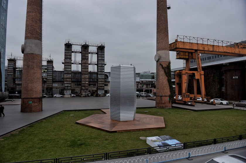 The Smog Free Tower stands at 751D.Park in the 798 Art Zone on October 20, 2016 in Beijing, China. Dutch designer Daan Roosegaarde and his team of experts created smog vacuum cleaners named "Smog Free Tower". The Tower can clean 30,000 square meters of air per hour by collecting at least 75% PM 2.5 and PM 10 smog particles in the air and releasing the fresh air in 360 degrees. Roosegaarde also designed the Smog Free Rings which contain ring planes consisting of the compressed smog particles. (VCG/VCG via Getty Images)