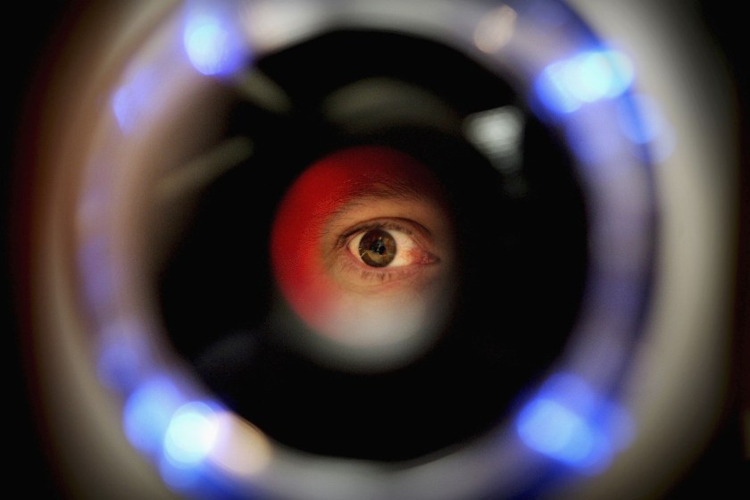A man uses an iris recognition scanner (Ian Waldie/Getty Images)