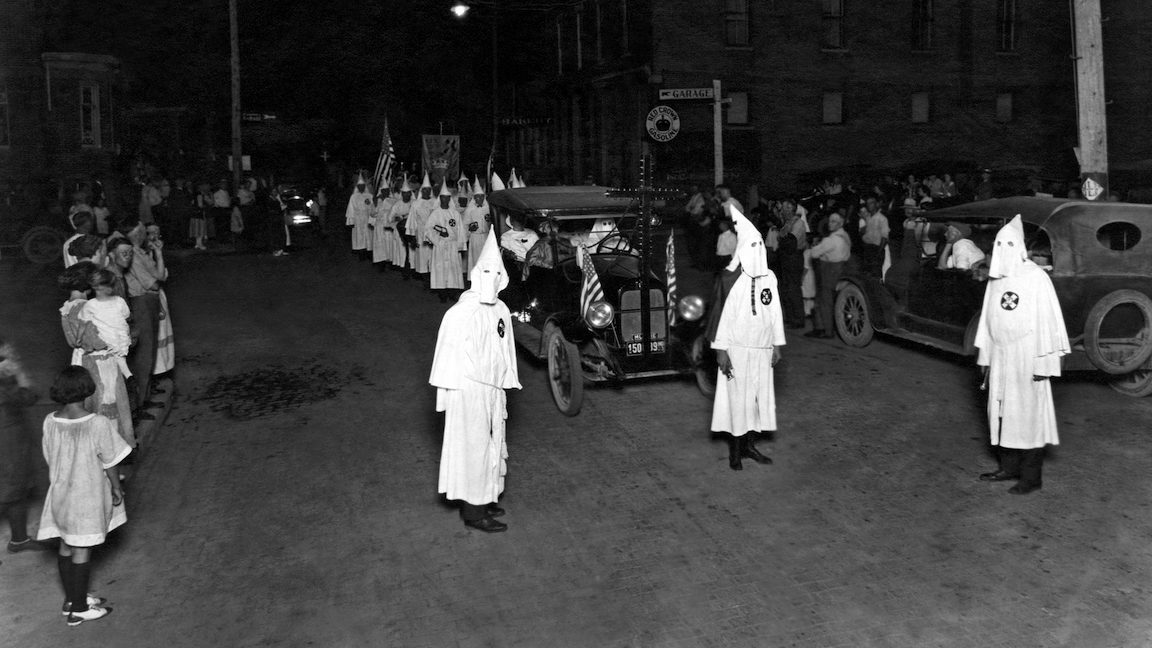 A Ku Klux Klan nighttime parade in Indiana. Muncie, Indiana:  1923.
(Photo by Underwood Archives/Getty Images)