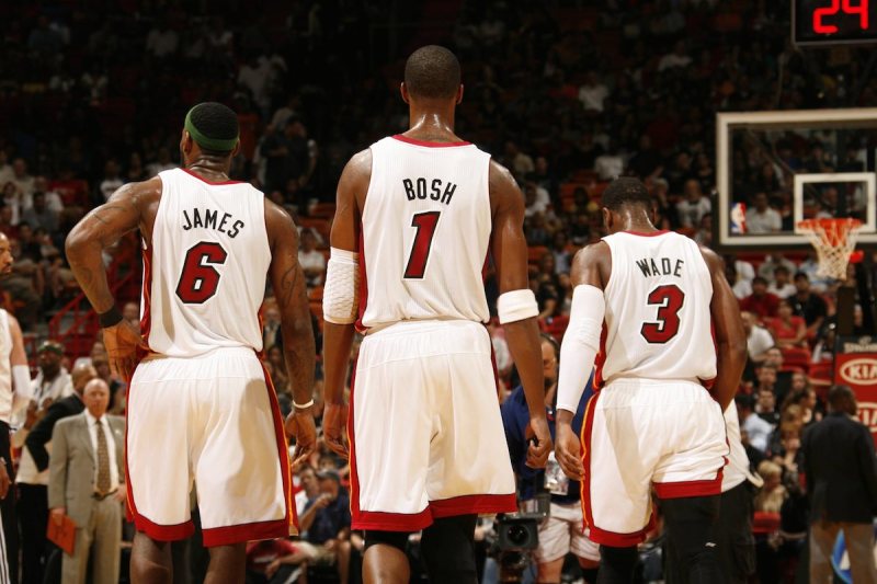 MIAMI, FL - APRIL 8: LeBron James #6, Chris Bosh #1, and Dwyane Wade #3 of the Miami Heat stand on the court during the NBA game against the Charlotte Bobcats on April 8, 2011 at American Airlines Arena in Miami, Florida. NOTE TO USER: User expressly acknowledges and agrees that, by downloading and/or using this Photograph, User is consenting to the terms and conditions of the Getty Images License Agreement. Mandatory copyright notice: Copyright NBAE 2011 (Photo by Issac Baldizon/NBAE via Getty Images)