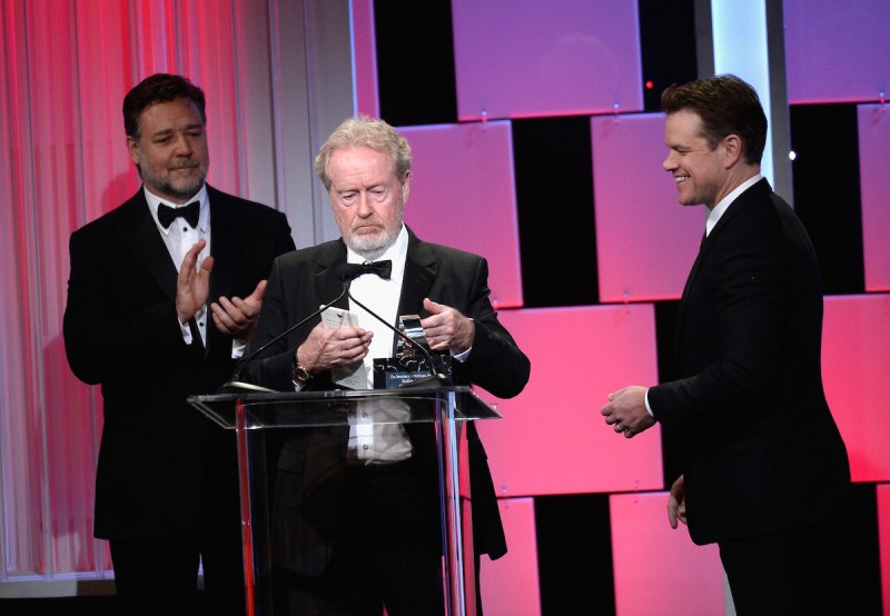 BEVERLY HILLS, CA - OCTOBER 14: Honoree Sir Ridley Scott (C) accepts the American Cinematheque Award from actors Russell Crowe and Matt Damon onstage at the 30th Annual American Cinematheque Awards Gala at The Beverly Hilton Hotel on October 14, 2016 in Beverly Hills, California. (Photo by Kevork Djansezian/Getty Images)