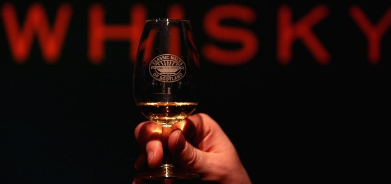 EDINBURGH, UNITED KINGDOM - MARCH 13: Andrew Kirk a malt advocate noses some whisky at Glenkinchie distillery March 13, 2008. Chancellor Alistair Darling has defended his decision to raise duty on whisky, for the first time in ten years. The Scottish Whisky Association say the rise has abandoned the government?s moves for a fairer alcohol tax policy. (Photo by Jeff J Mitchell/Getty Images)