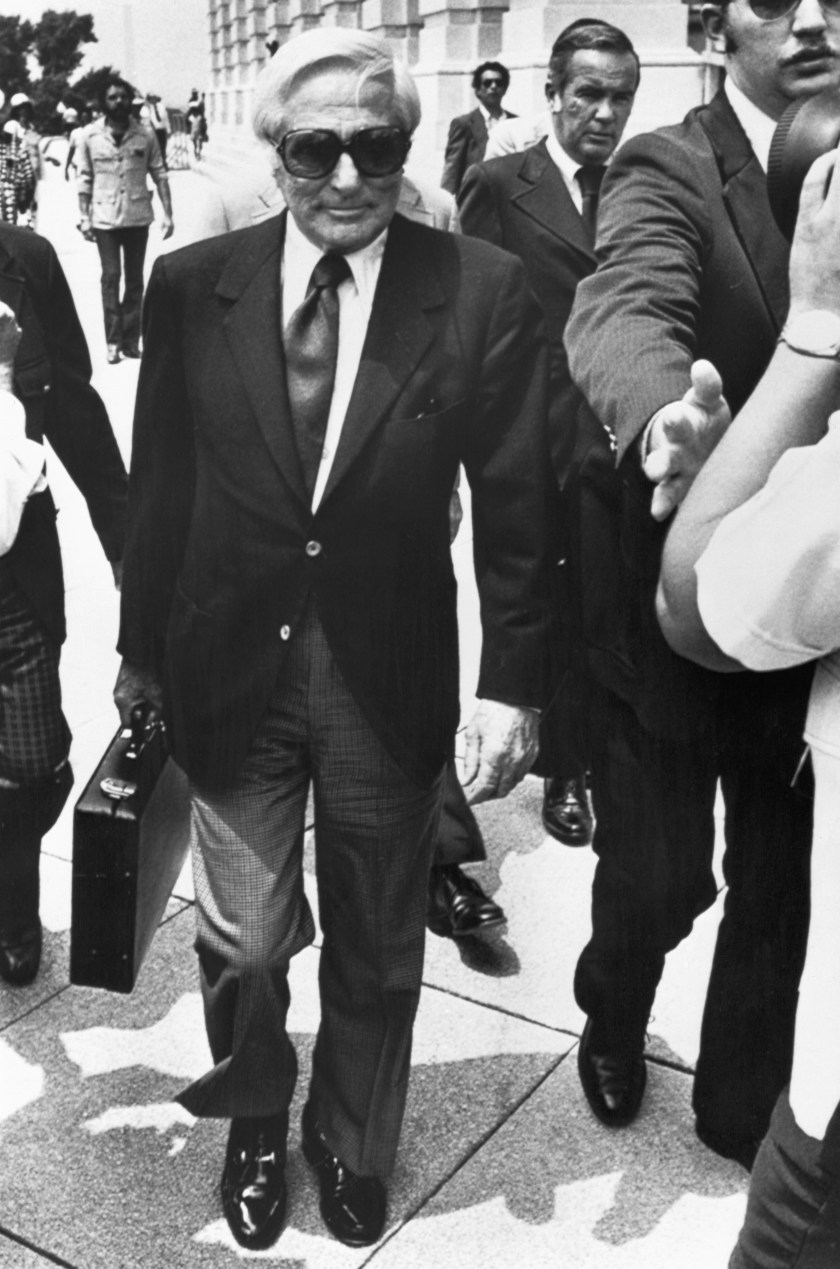 John Roselli, a reputed underworld figure from the days of Al Capone, arrives under tight security to appear before the Senate Select Committee on Intelligence to testify about his connection with the CIA and an alleged 1961 plot to assassinate Cuban Premier Fidel Castro. (Bettmann/Contributor/Getty Images)