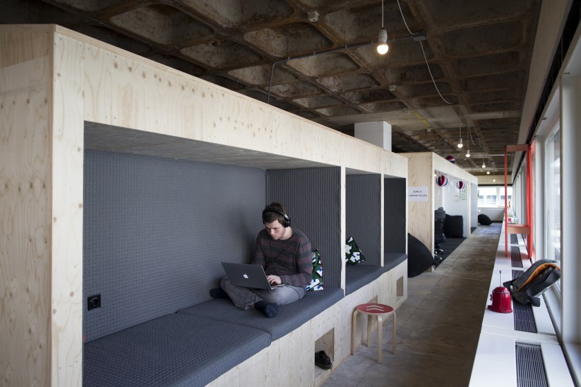 An employee uses an Apple Inc. laptop in a workspace cubbyhole inside the headquarters of startup company Blendle BV in Utrecht, Netherlands, on Wednesday, March 30, 2016. (Jasper Juinen/Bloomberg via Getty Images)