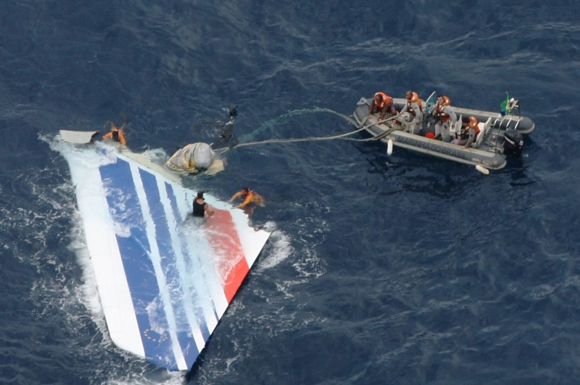 Handout image released on June 8, 2009 by the Brazilian Air Force (FAB) shows crew members preparing to tow a part of the wreckage of a Air Bus A330-200 jetliner which crashed in the Atlantic Ocean with 228 people on board in a flight from Rio de Janeiro to Paris. (Forca Aerea Brasileira via LatinContent/Getty Images)